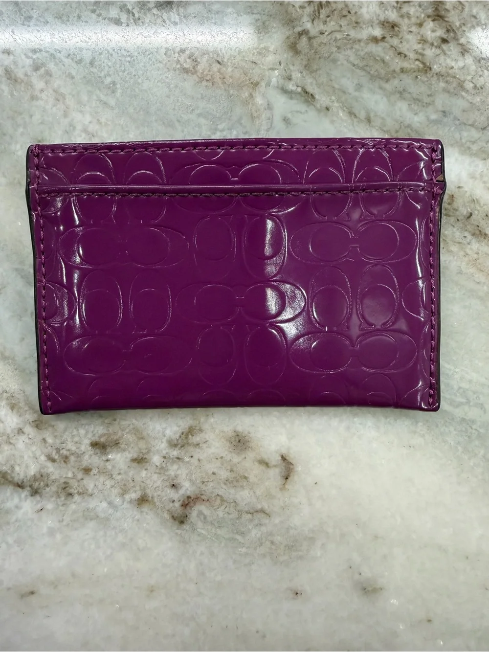 Embossed Coach Card Case in Deep Purple